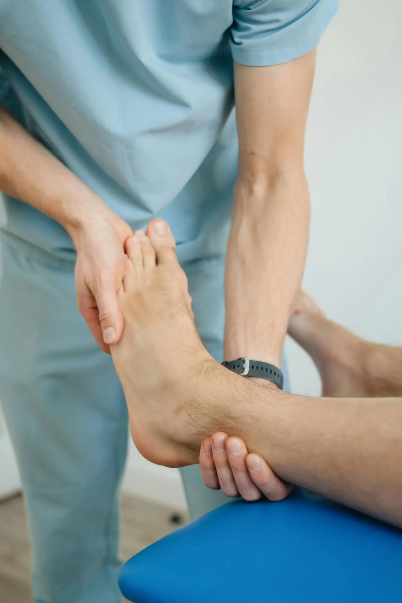 Professional foot care treatment being administered